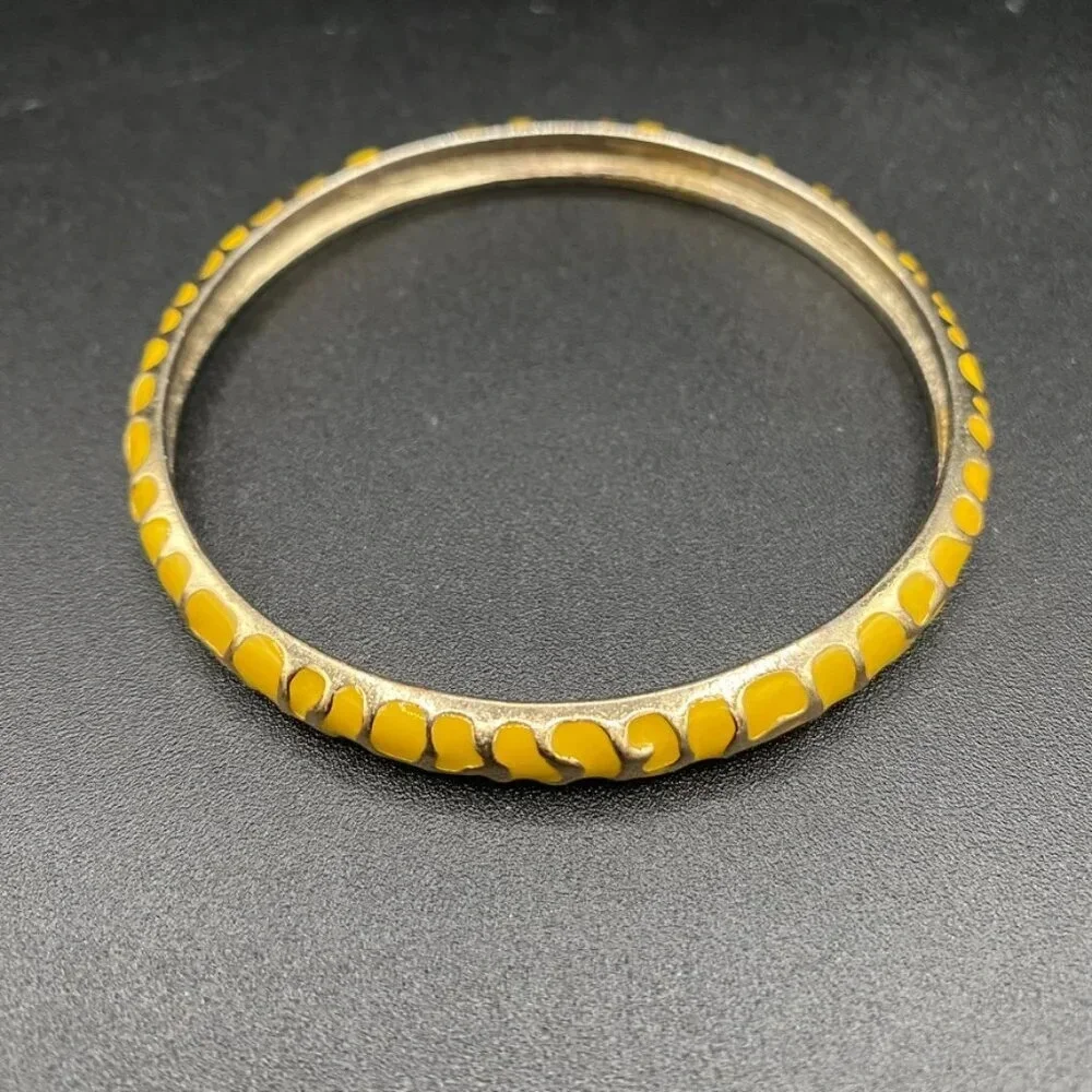 Gold enamel stacking bangle bracelet set in gold tone